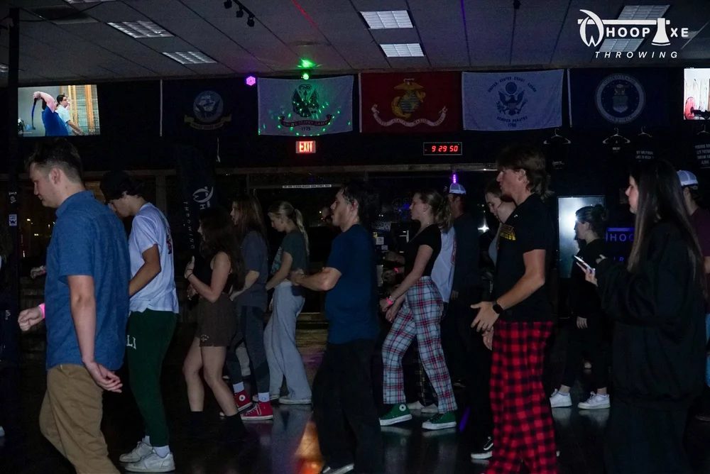 Crowd on the floor during an evening event