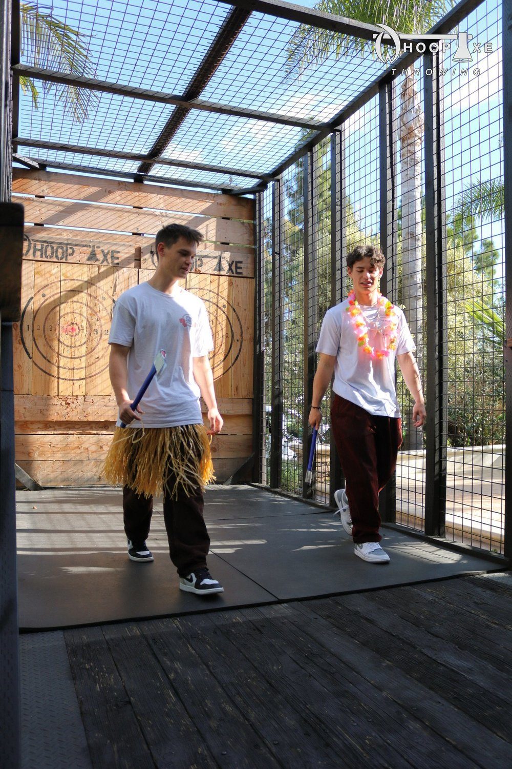 Two guests in a throwing lane